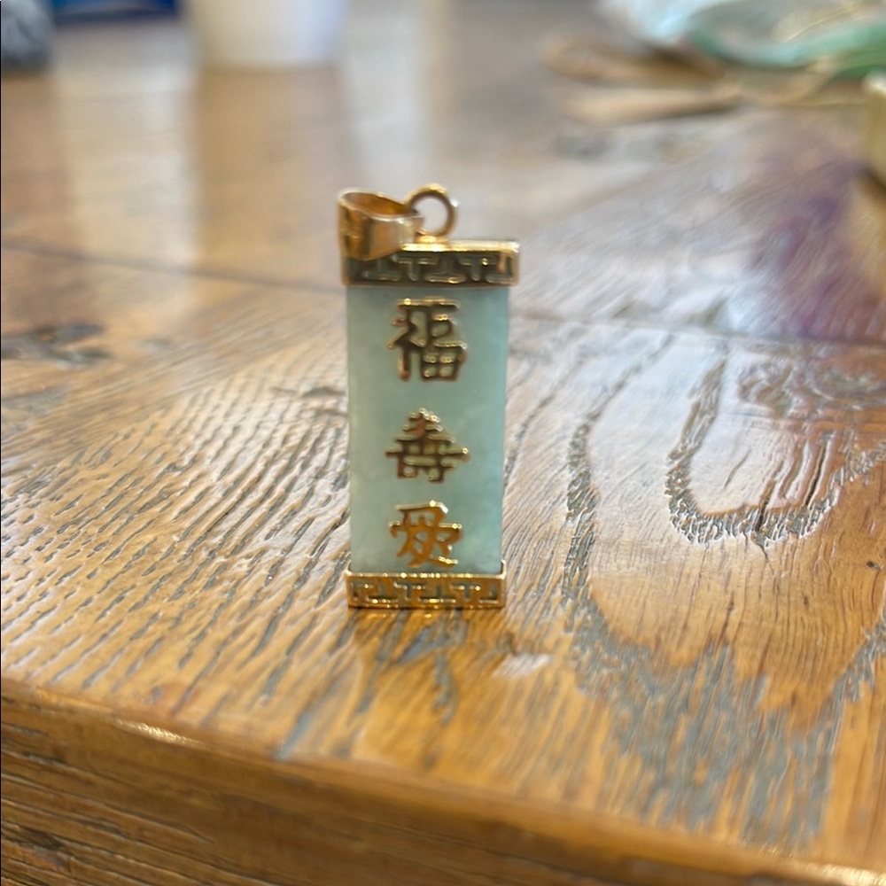 Elegant Gold and Jade Charm
